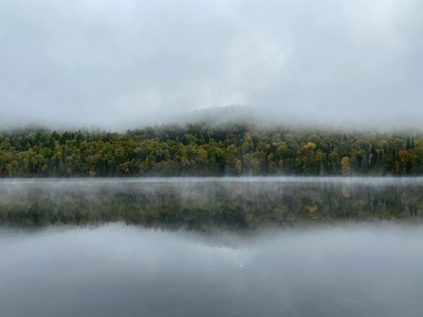 How to ensure safe navigation while camping in the foggy conditions of the Lake District?